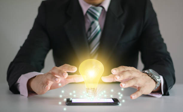 istock Light bulb new ideas with innovative technology solution concepts hands of the businessman. 1226006597