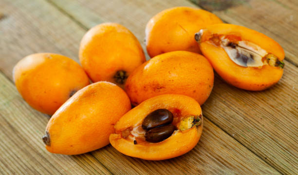 istock Whole and halved Japanese medlar 1226008217
