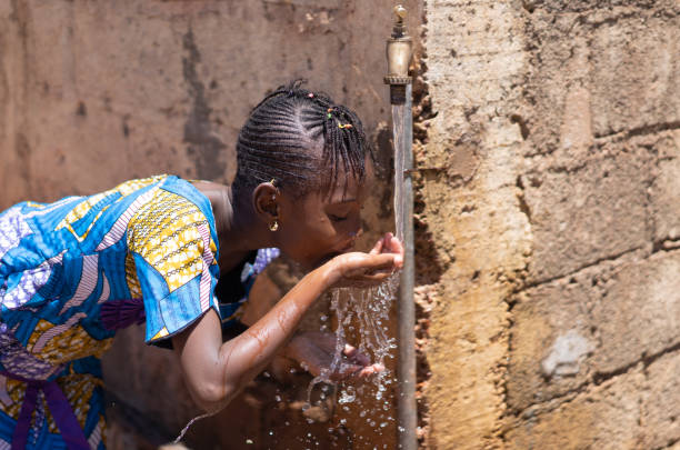 istock Gorgeous African Student Drinking Freshwater 1226011417