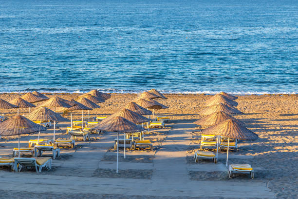 istock Public beach at the tropical resort with no people background. 1226012067