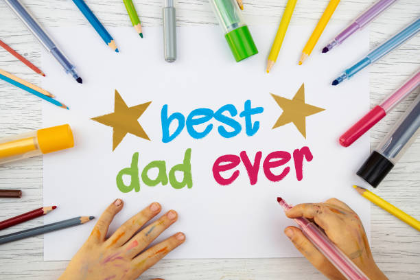 istock Little girl is drawing about Best Dad Ever. 1226017778