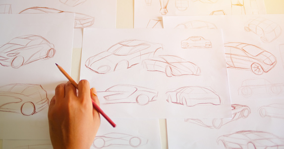 Graphic designer artist Work drawing sketch design development Prototype car Automotive industrial creative visual concept