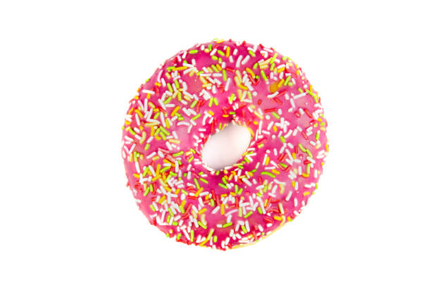 istock Pink Doughnut cut out standing on white background with shadow 1226019905