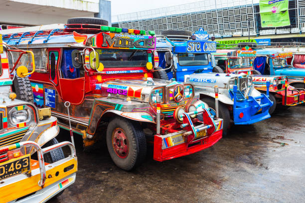 MANILA, PHILIPPINES - FEBRUARY 25, 2013: Jeepneys are popular public transport in the Philippines, they made from old US military jeeps