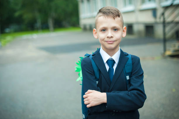 istock a boy goes to school on the first of September 1226021286
