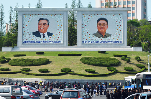 Pyongyang, North Korea - April 29, 2019: View of the downtown Pyongyang  and portraits of two presidents DPRK