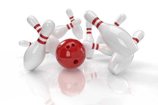 istock Bowling game concept: red ball with bowling pins (clipping path) 1226025386