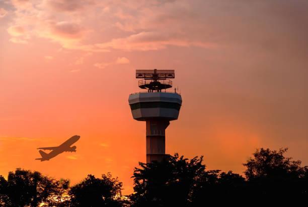 istock Silhouette of  radar tower and airliner 1226029430