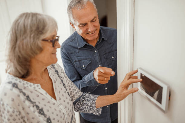 istock Senior woman using the intelligent home system 1226038074