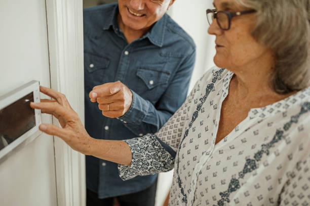 istock Senior woman using the intelligent home system 1226038095