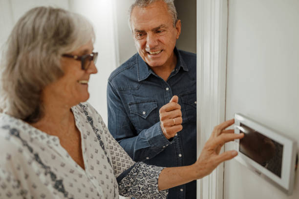 istock Senior woman using the intelligent home system 1226038119