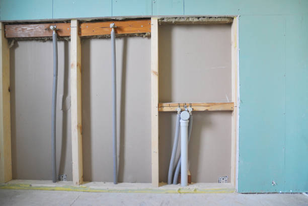 istock Bathroom water pipeline system with insulation and drain pipe renovation under drywall boards. 1226040367