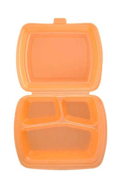 istock Food Open Tray with three rounded cells. Orange color. Empty food container with lid made from polystyrene foam isolated on a white background. lunch box for sushi, rolls, barbecue. Top view. 1226041993