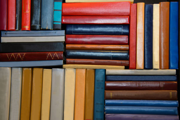 istock Old books on a shelf. Vintage library close. 1226042881