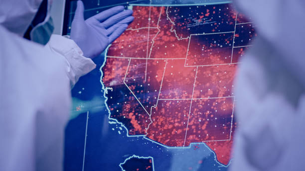 ученые смотрят на экран со вспышками сша-западного побережья. высокая инфекционность - infectivity стоковые фото и изображения