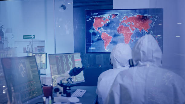 istock Scientists in laboratory. World biggest outbreaks on a map. Very high infectivity 1226044050