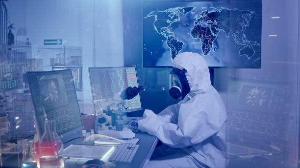 istock Scientist in futuristic laboratory working with biohazardous substance. First infections on world map 1226044234