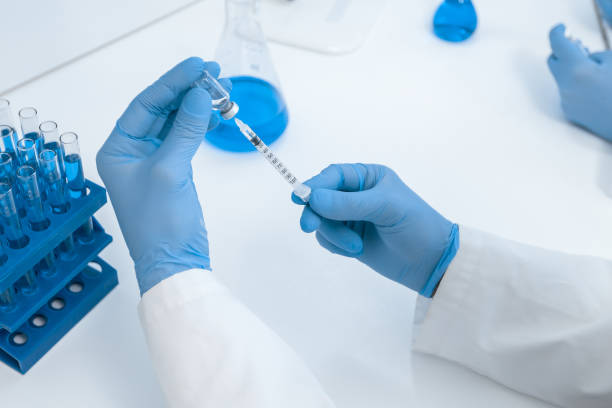 istock close up. a group of scientists are working with tests for coronavirus 1226044580