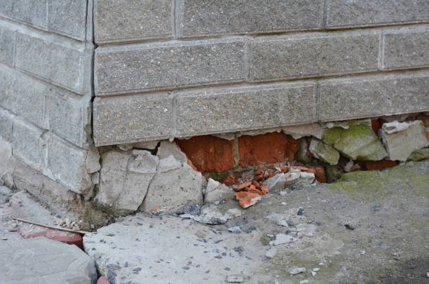 istock Foundation house wall damage from wetness. Foundation walls without waterproofing. Cracked foundation wall corner. 1226049438