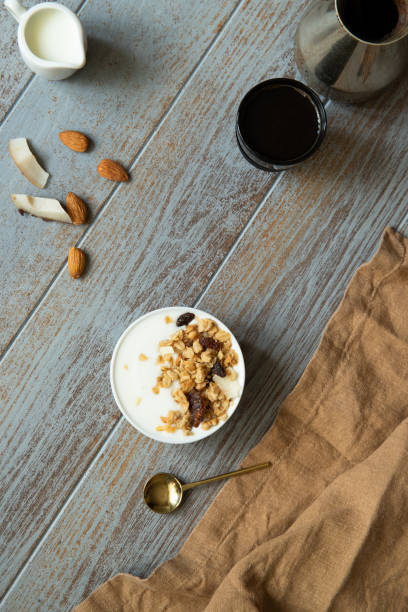 istock granola dairy bowl and black espresso coffee on wooden table 1226053162