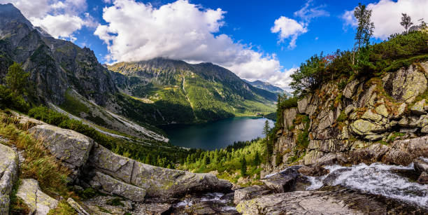 Morskie Oko in High Tatras Morskie Oko, or Eye of the Sea in English, is the largest and fourth-deepest lake in the Tatra Mountains, in southern Poland. high tatras stock pictures, royalty-free photos & images