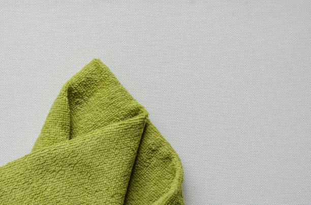 istock Green bath towel on a white textured background. 1226062131