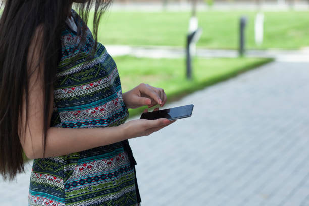 istock woman hand smart phone 1226062896