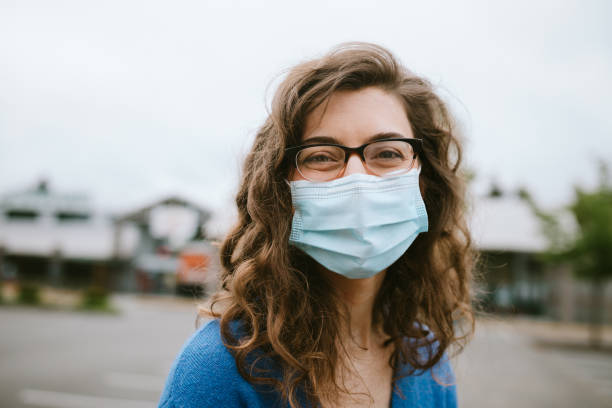 Cheerful Smiling Woman Wearing Face Mask