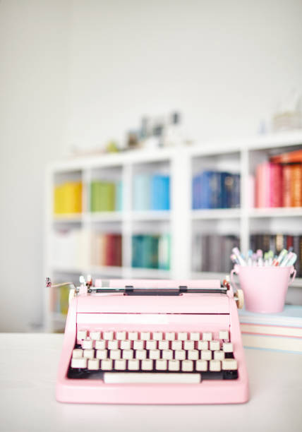 istock Modern home office with beautiful pink vintage typewriter 1226065460