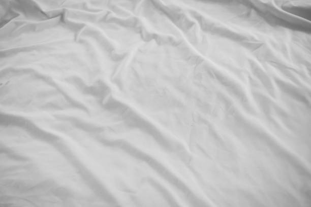 istock Crumpled bed linen in the morning. 1226065777