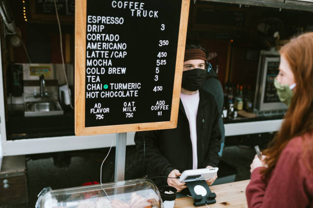 istock Masked Customer Orders Coffee And Snacks at Food Truck 1226065938
