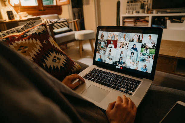istock Young woman using a laptop on the sofa at home to have a work conference call 1226068267