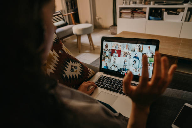 istock Young woman using a laptop on the sofa at home to have a work conference call 1226068275