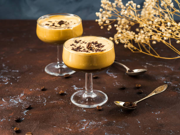 istock Frappe coffee in dessert glasses on brown backdrop 1226068480