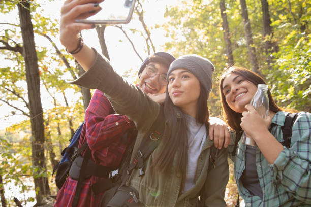istock People hiking outside in nature talking selfies 1226071142