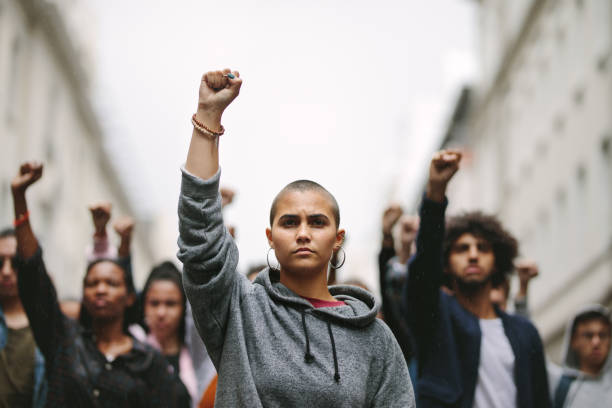 istock Multi-ethnic people demonstrating on the road 1226075305