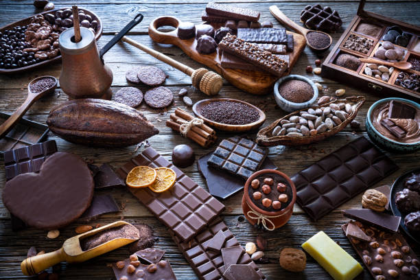istock Assorted chocolate products with bars cocoa beans nuts spices 1226077982