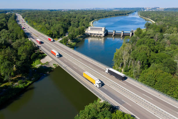 istock Trucks on Highway Bridge, Aerial View, Beautiful Landscape 1226078092