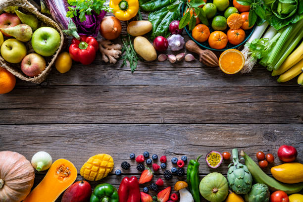 vegetables and fruits vegan food assorted arrangement on wood - arugula freshness food herb imagens e fotografias de stock