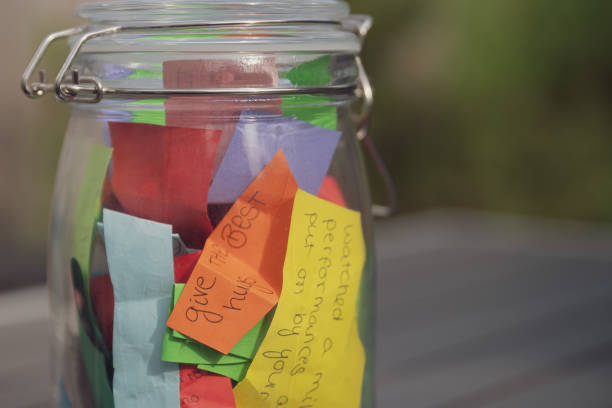 Thank you jar with message 'give the best hugs' stock photo