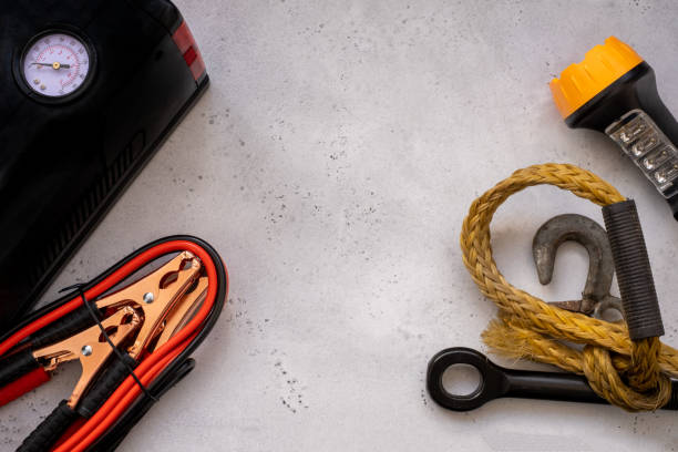 istock led light, tow rope and lighting wires, auxiliary start-up frost-resistant and compressor for pumping tires. 1226082495
