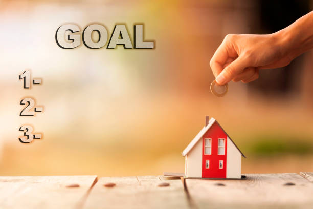 istock Real Estate Agent with house model and saving concepts 1226082980