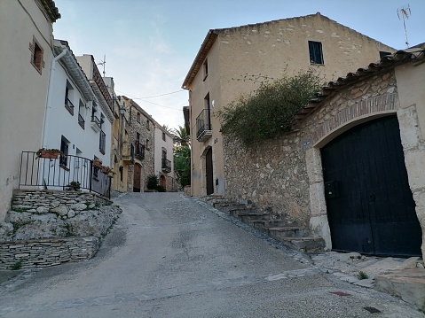 Sant Vicenç de Calders, El Vendrell, Spain – May 19, 2020: Carrer del Pou, the way up to the old village.