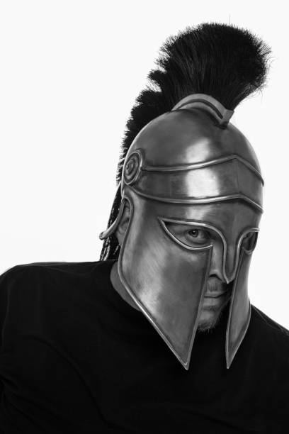 istock Man in historical copy helmet Spartan warrior on a white background 1226090843