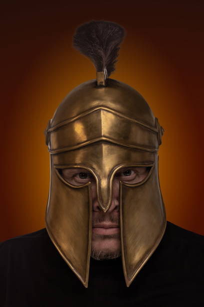 istock Man in historical copy helmet Spartan warrior on a white background 1226090845