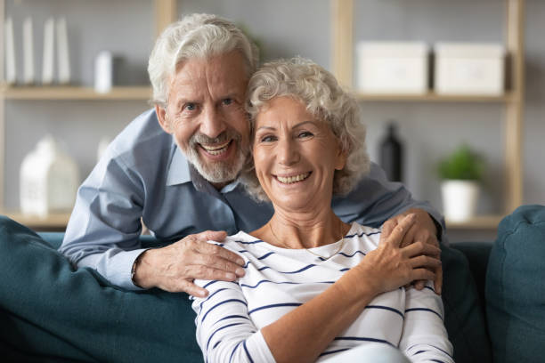 istock Emotional positive retired married couple looking at camera. 1226093623