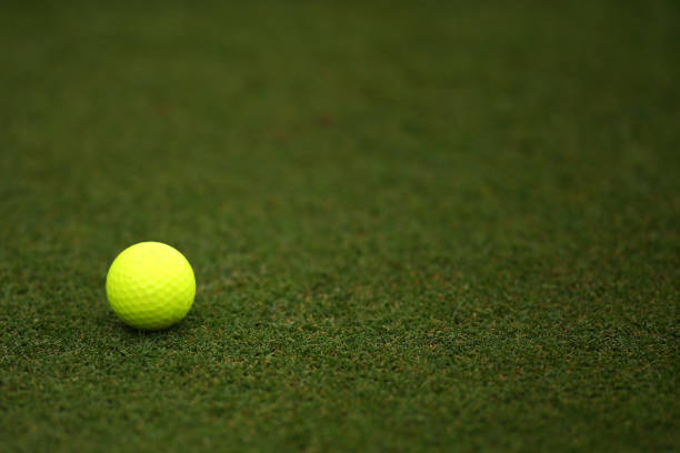 istock Yellow Golf Ball on Putting Green 1226094529