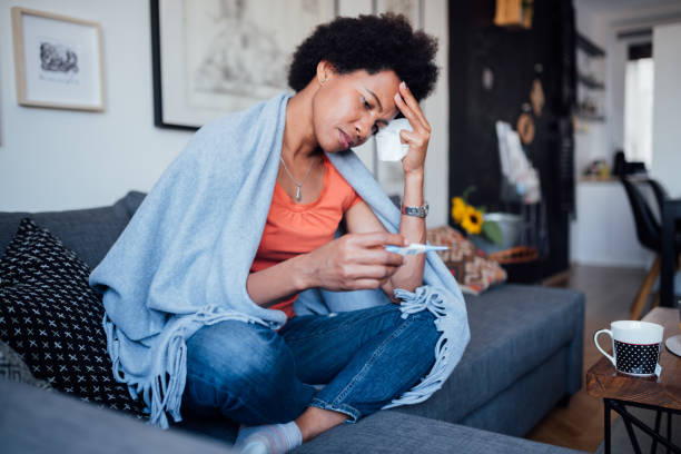 istock Young woman feeling symptoms of an illness 1226097621