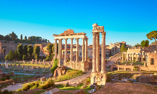 Empty Rome at dawn. Panoramic image of Roman Forum, or Foro di Cesare, or Forum of Caesar, in Rome, Italy, early in the morning