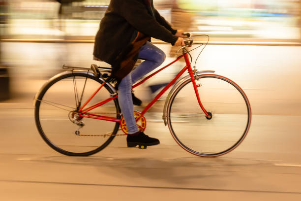 istock bicycle rider in the city at night 1226101791